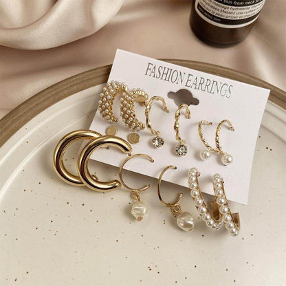 AVR JEWELS Combo Of 9 Stunning Gold Plated Pearl Studs and Hoop Earrings- Brand Kiosk Store